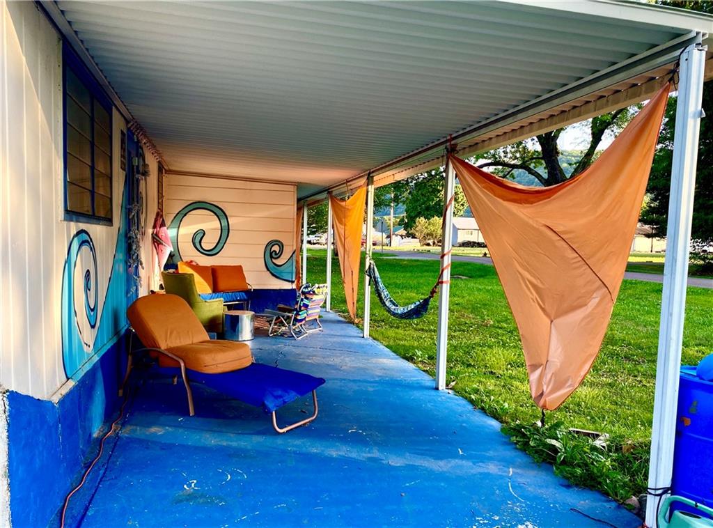 631 Meyers Street Confluence, PA 15424 - Photo 18 of 27 a backyard of a house with seating space