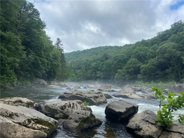 a view of a chairs and table in a patio