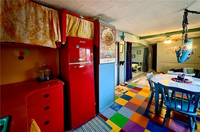 a living room filled with furniture and a rug