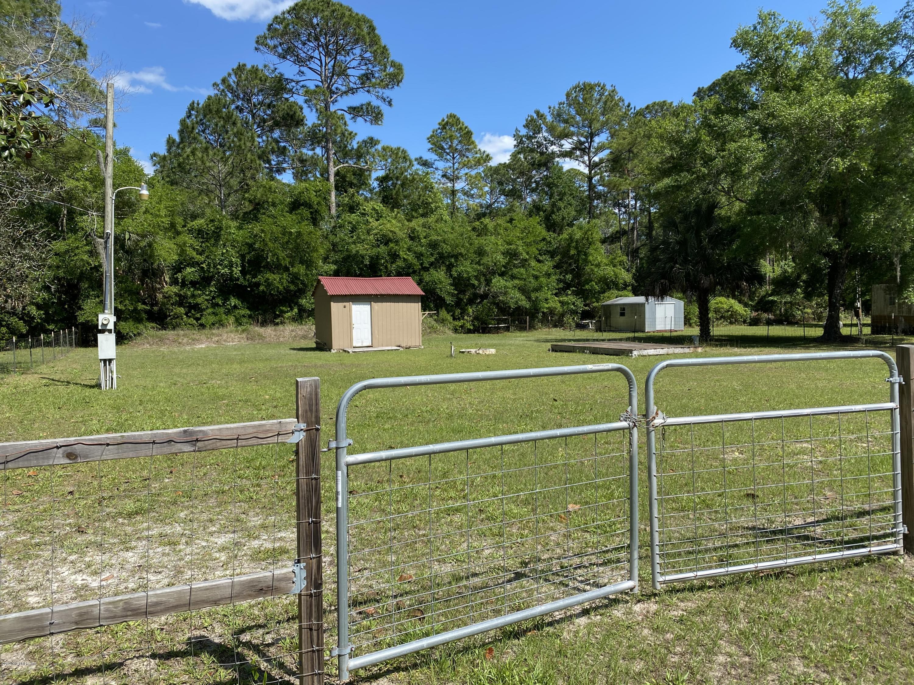 408 1st Street Steinhatchee, FL 32359 - Photo 1 of 6 a view of a tennis court