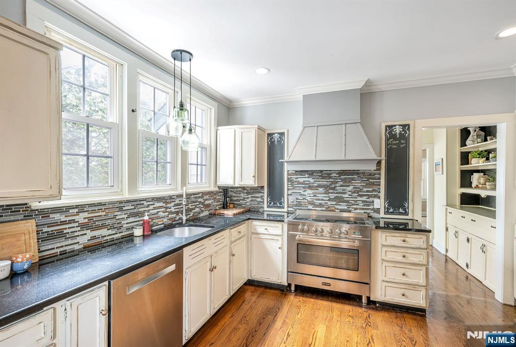 203 Long Pond Road West Milford, NJ 07421 - Photo 14 of 50 a kitchen with stainless steel appliances a stove sink and cabinets