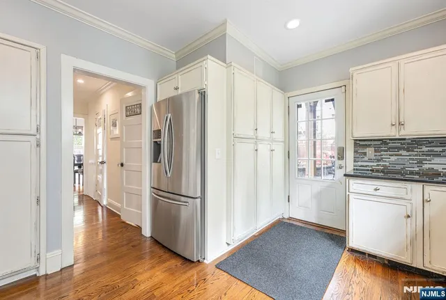 a front view of a house with a garage