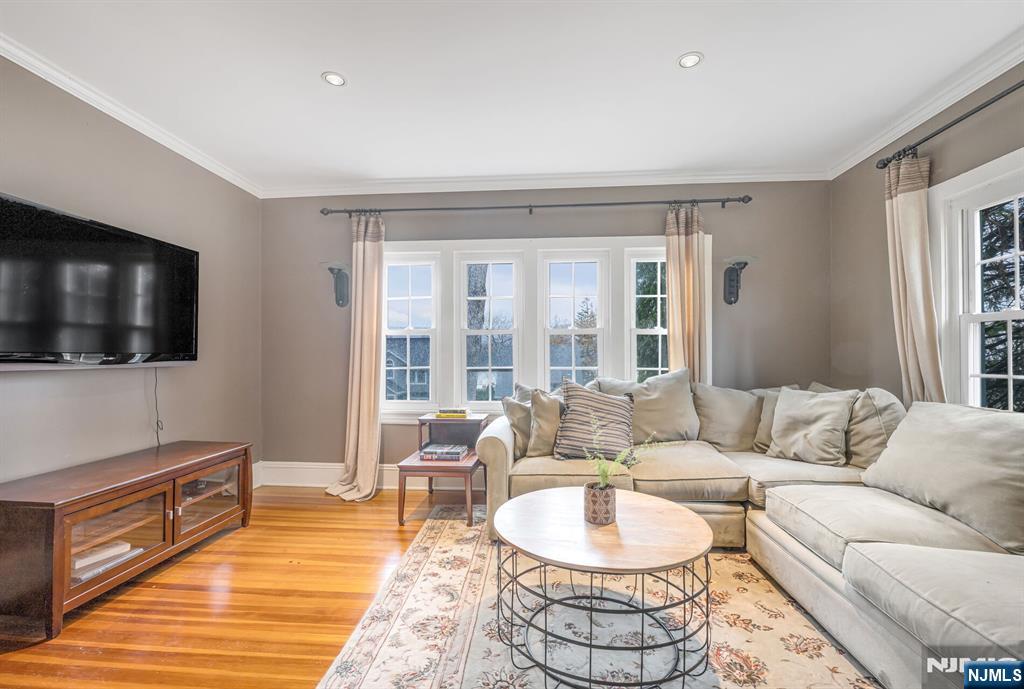 203 Long Pond Road West Milford, NJ 07421 - Photo 24 of 50 a living room with furniture and a flat screen tv