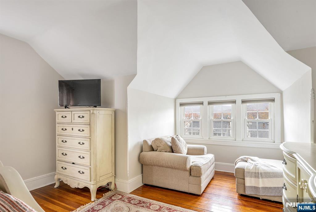 203 Long Pond Road West Milford, NJ 07421 - Photo 30 of 50 a living room with furniture and a flat screen tv