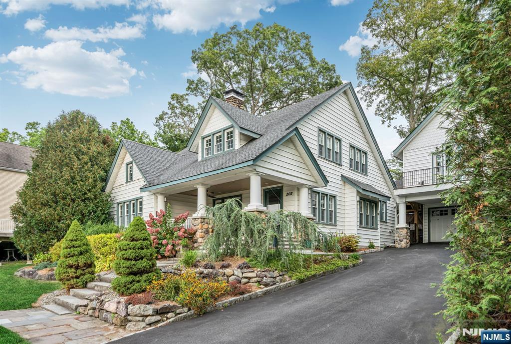 203 Long Pond Road West Milford, NJ 07421 - Photo 4 of 50 a front view of a house with a garden