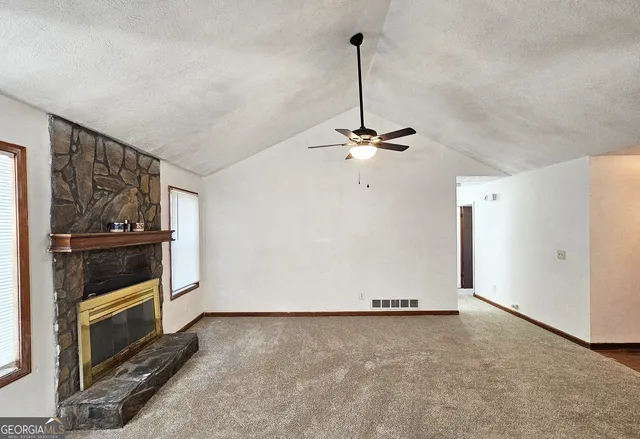 a view of a livingroom with a furniture