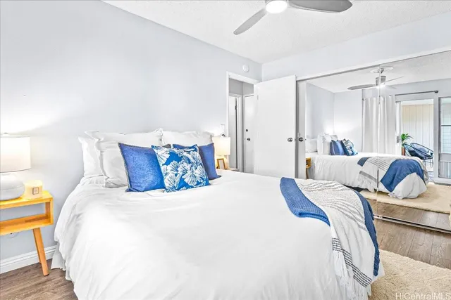 a bedroom with a bed and a couch