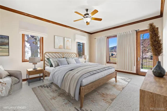 a spacious bathroom with a granite countertop tub a sink and a large mirror