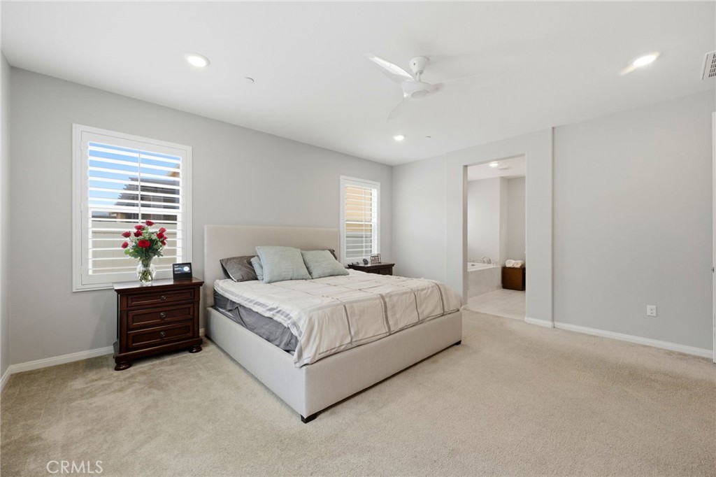 20948 Center Street Riverside, CA 92507 - Photo 50 of 92 a spacious bedroom with a bed and a window