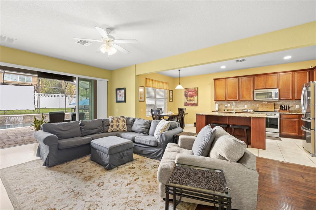 13243 Charfield Street Windermere, FL 34786 - Photo 20 of 39 a living room with furniture and a large window