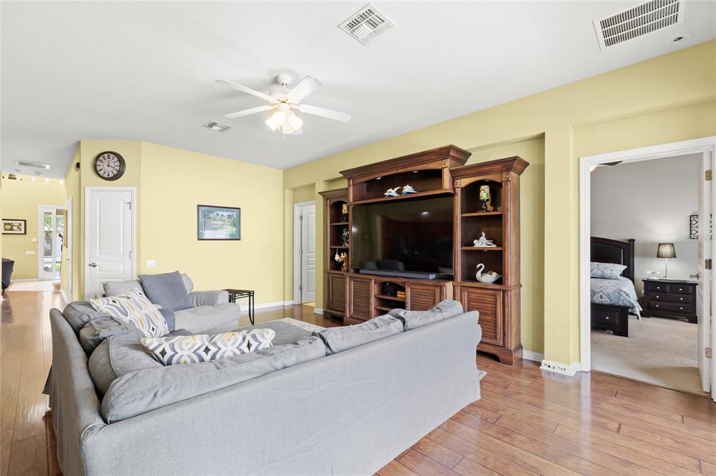 13243 Charfield Street Windermere, FL 34786 - Photo 21 of 39 a living room with furniture and a flat screen tv
