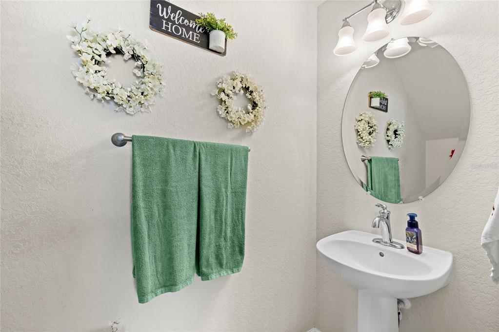 13243 Charfield Street Windermere, FL 34786 - Photo 26 of 39 a bathroom with a sink and a mirror