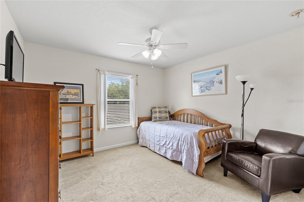 13243 Charfield Street Windermere, FL 34786 - Photo 27 of 39 a living room with furniture and a window