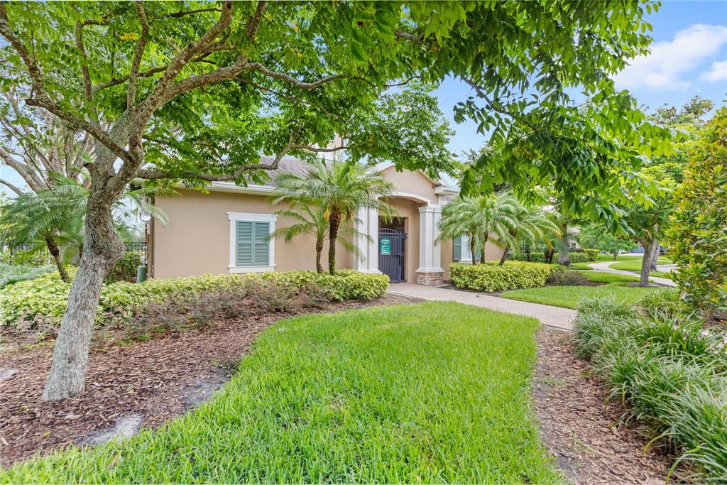 13243 Charfield Street Windermere, FL 34786 - Photo 37 of 39 a front view of a house with garden