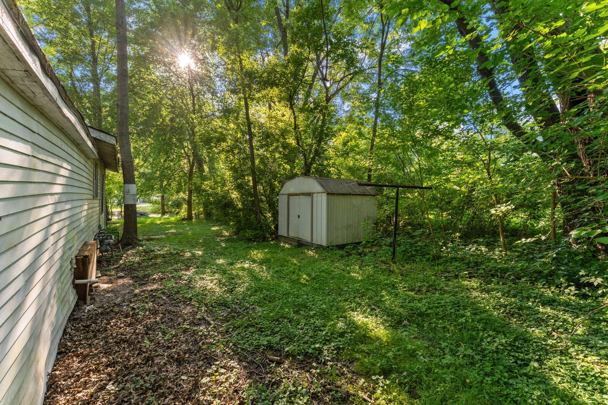1910 South Calhoun Street Griffith, IN 46319 - Photo 11 of 34 a backyard of a house with lots of green space