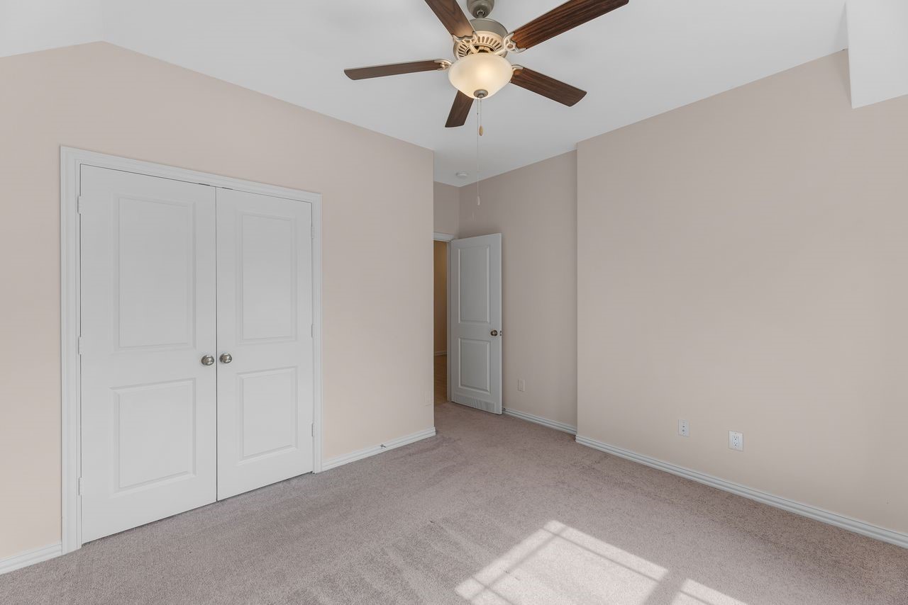 21714 Grayson Highlands Way Porter, TX 77365 - Photo 19 of 27 a view of an empty room