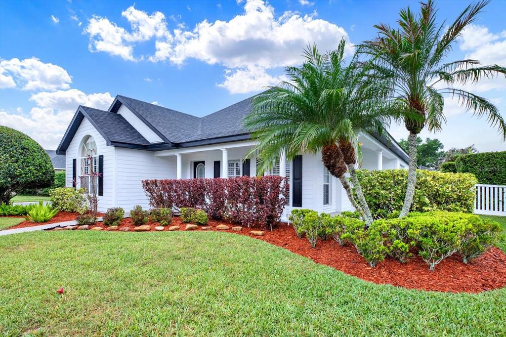 2021 Meadow Rue Court Trinity, FL 34655 - Photo 27 of 41 a front view of house with yard and green space