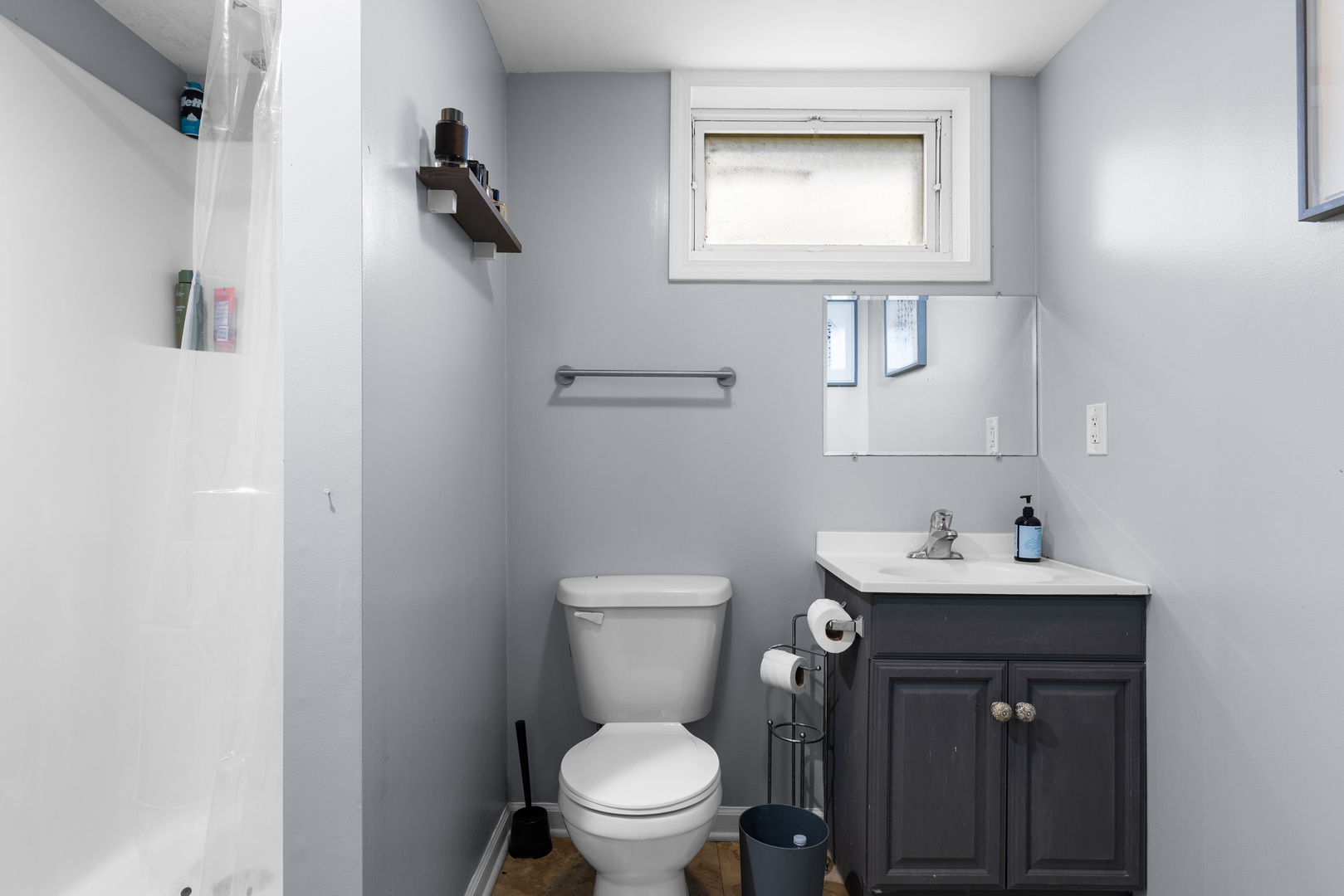 2019 Hawthorn Road Marengo, IL 60152 - Photo 14 of 24 a bathroom with a toilet a sink and mirror