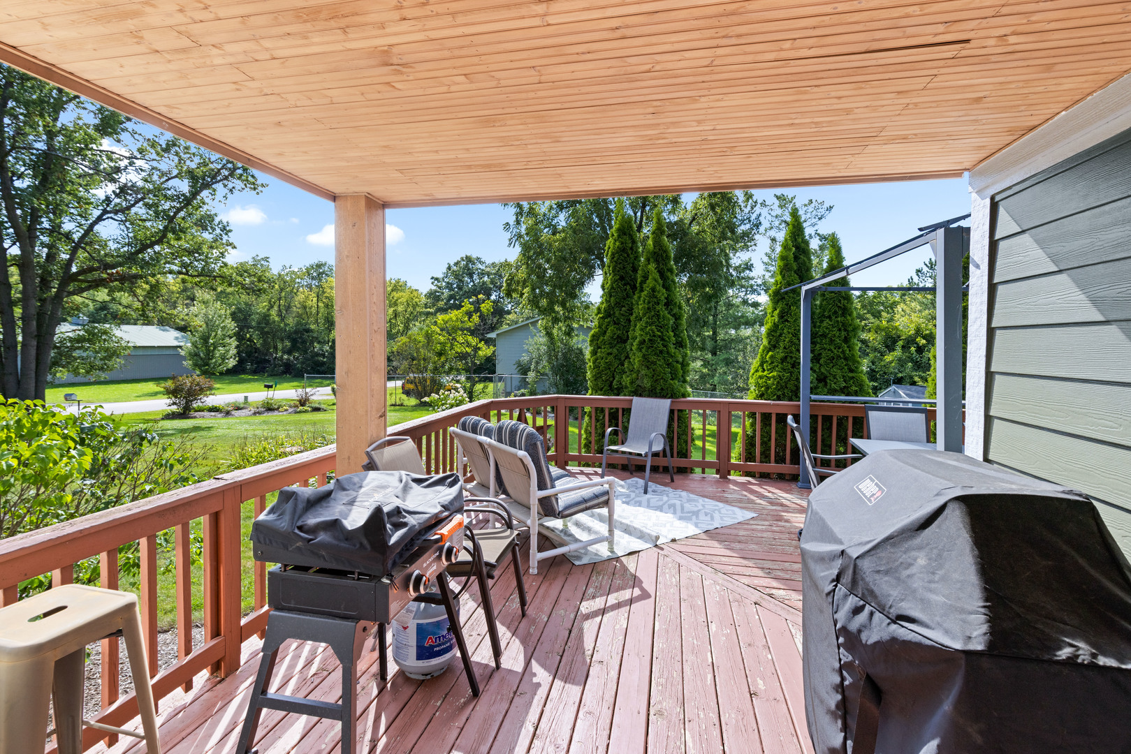 2019 Hawthorn Road Marengo, IL 60152 - Photo 18 of 24 a view of a balcony with chairs and wooden floor