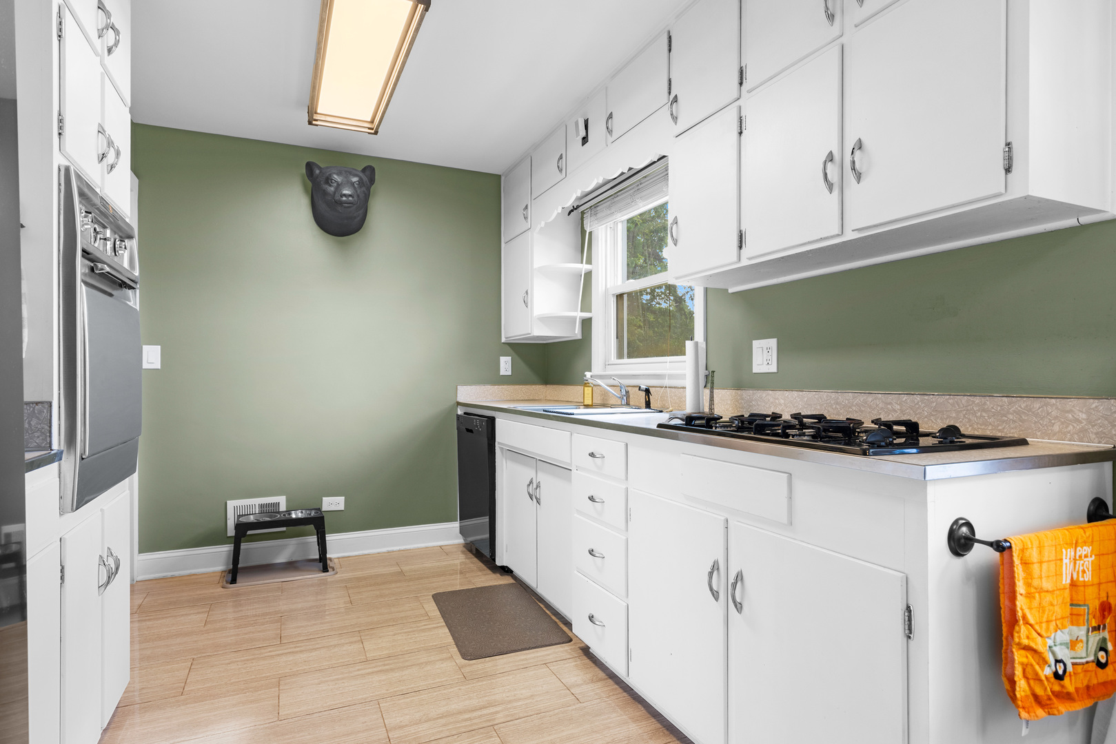 2019 Hawthorn Road Marengo, IL 60152 - Photo 7 of 24 a kitchen with granite countertop a sink a stove and cabinets
