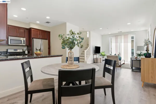 a view of a dining room with furniture