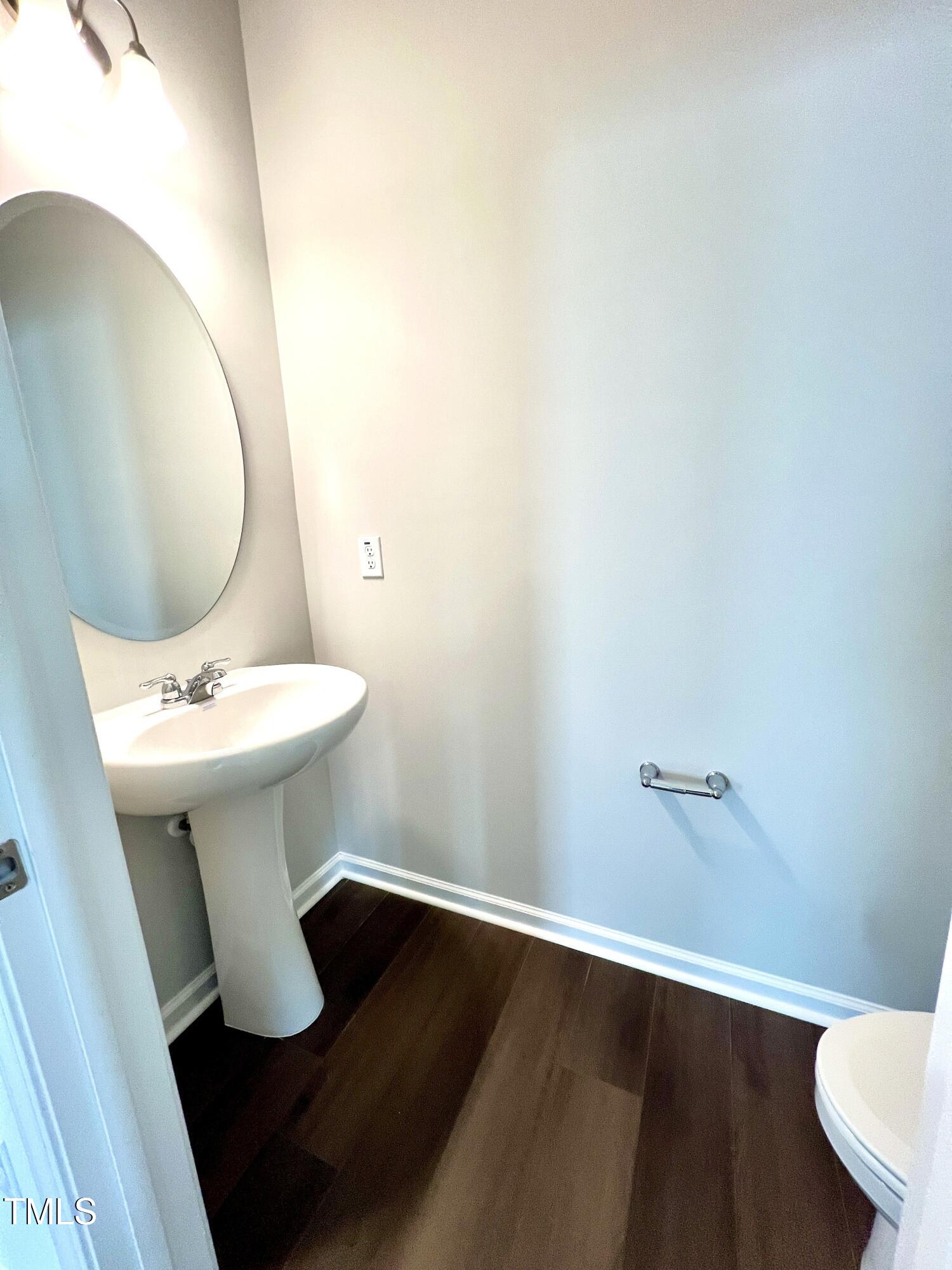 429 Lily Grv Loop Raleigh, NC 27610 - Photo 14 of 32 a bathroom with a sink toilet