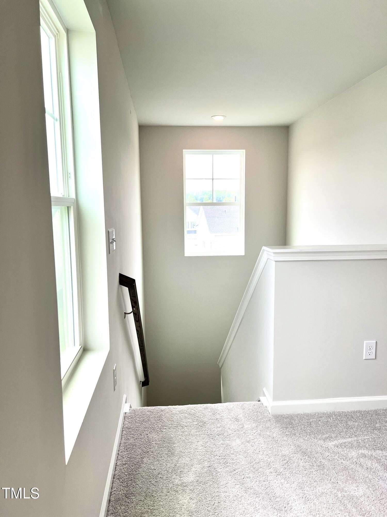 429 Lily Grv Loop Raleigh, NC 27610 - Photo 17 of 32 a view of a room with windows