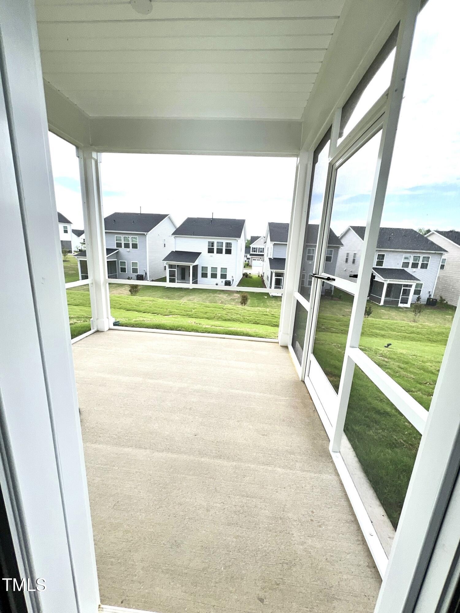 429 Lily Grv Loop Raleigh, NC 27610 - Photo 28 of 32 a view of a living room and a porch