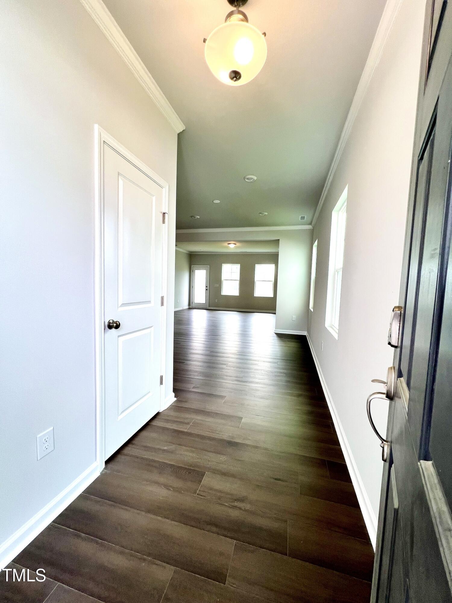 429 Lily Grv Loop Raleigh, NC 27610 - Photo 4 of 32 a view of gallery with wooden floor