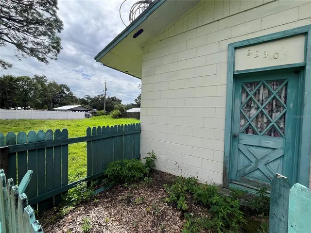a view of a bird door of the house
