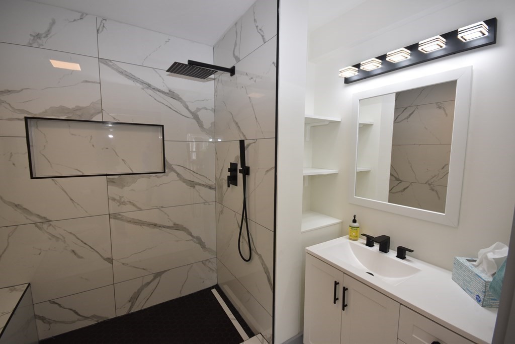 129 Plumtree Road Sunderland, MA 01375 - Photo 21 of 42 a bathroom with a sink vanity and mirror