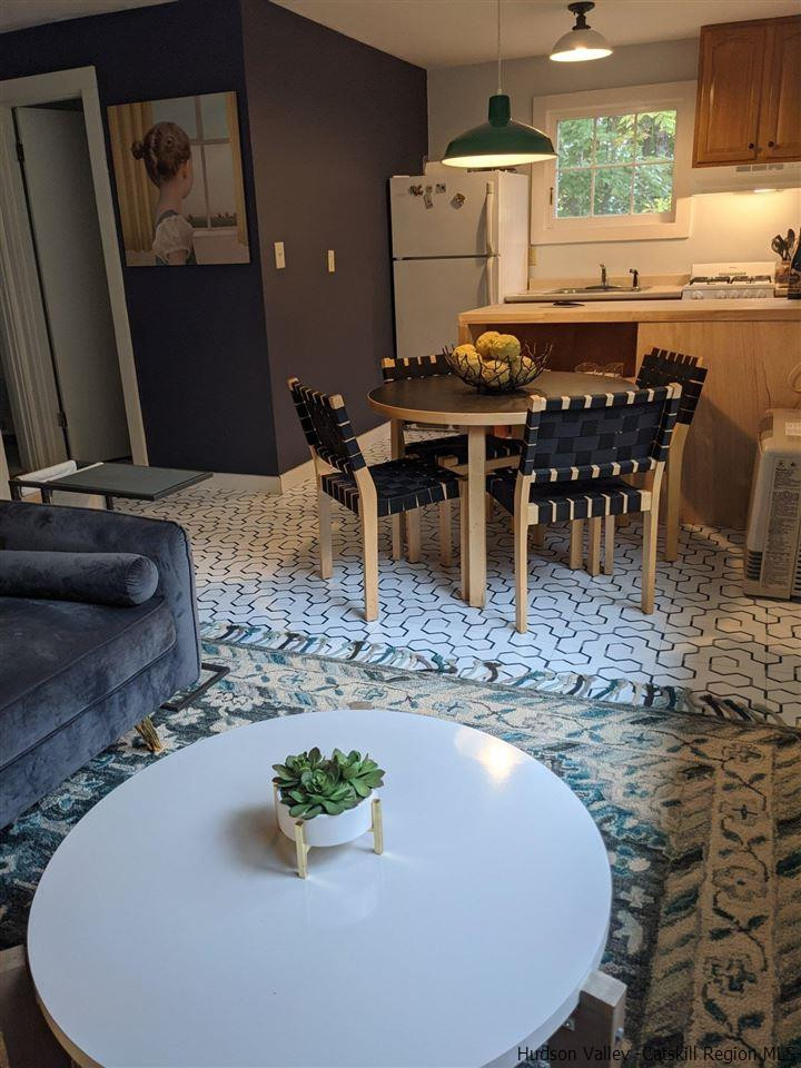 61 Birch Pine Hill Pine Hill, NY 12465 - Photo 5 of 11 a view of a dining room with furniture window and wooden floor
