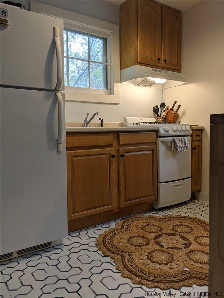 61 Birch Pine Hill Pine Hill, NY 12465 - Photo 6 of 11 a kitchen with a stove and a refrigerator