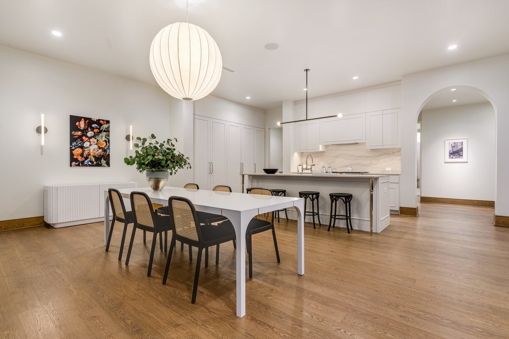 21 North May Street, Unit 701 Chicago, IL 60607 - Photo 8 of 25 a view of a dining room with furniture and wooden floor