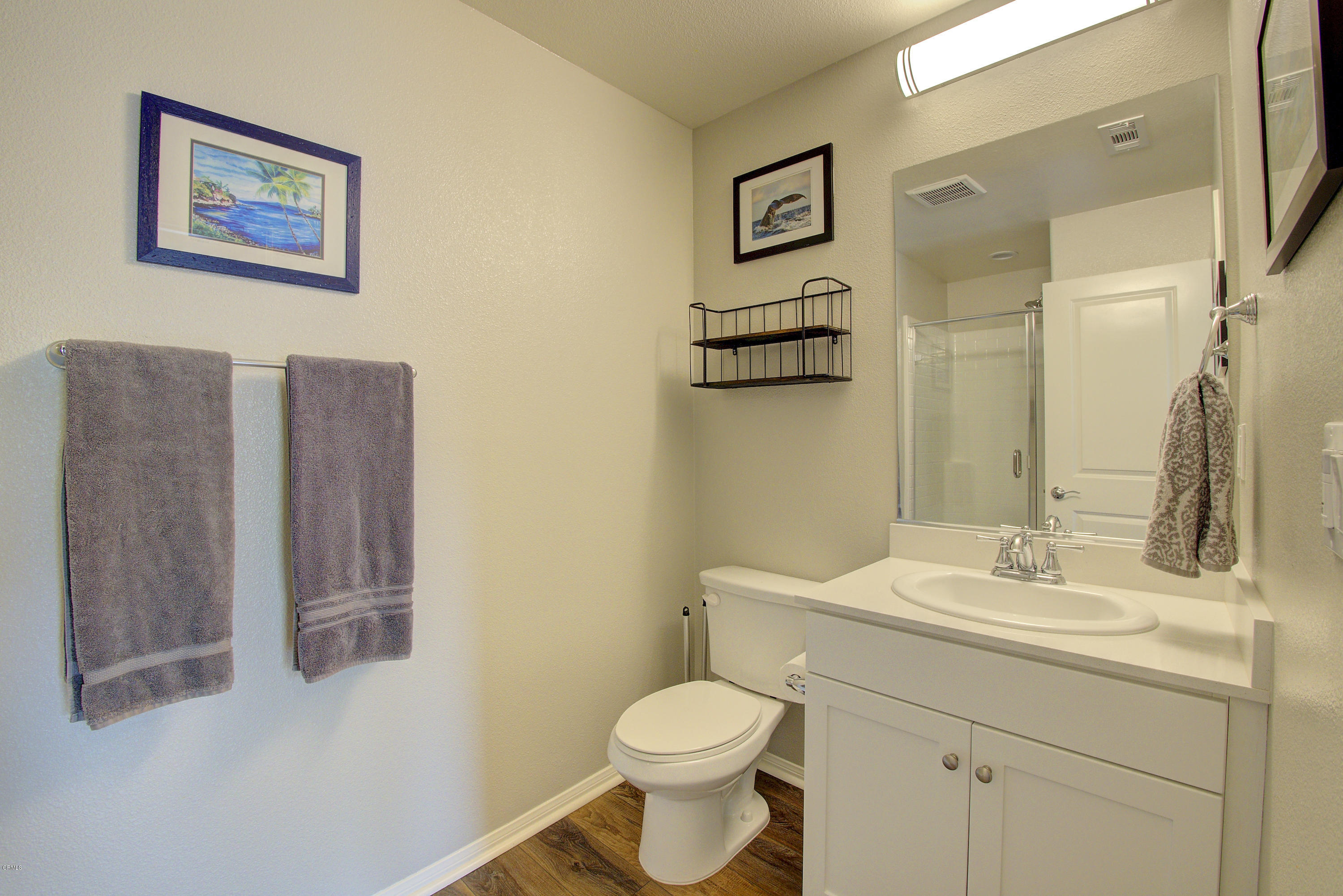 178 Prairie Street Camarillo, CA 93010 - Photo 11 of 74 a bathroom with a toilet sink and mirror