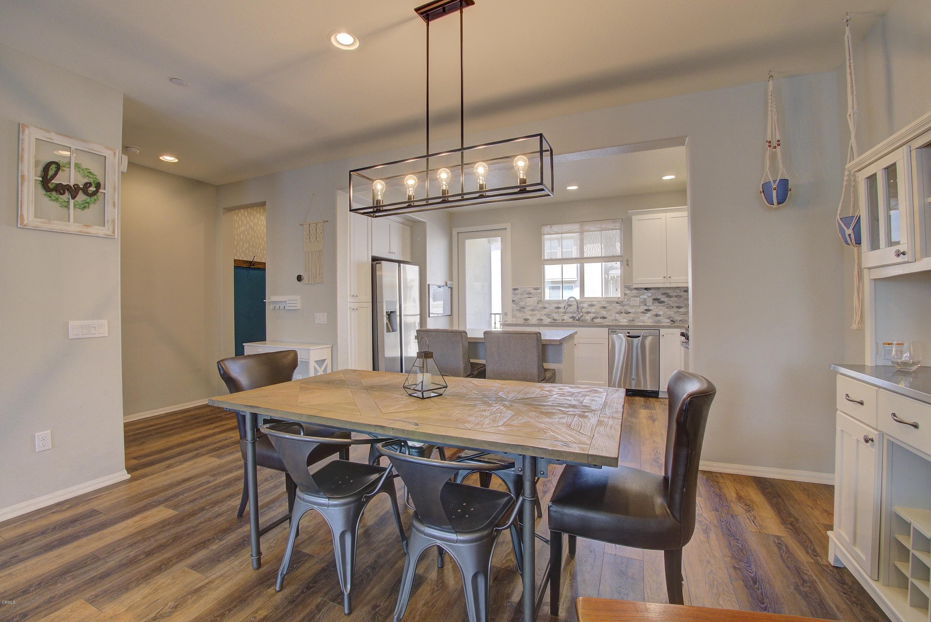 178 Prairie Street Camarillo, CA 93010 - Photo 15 of 74 a view of a dining room with furniture window and wooden floor