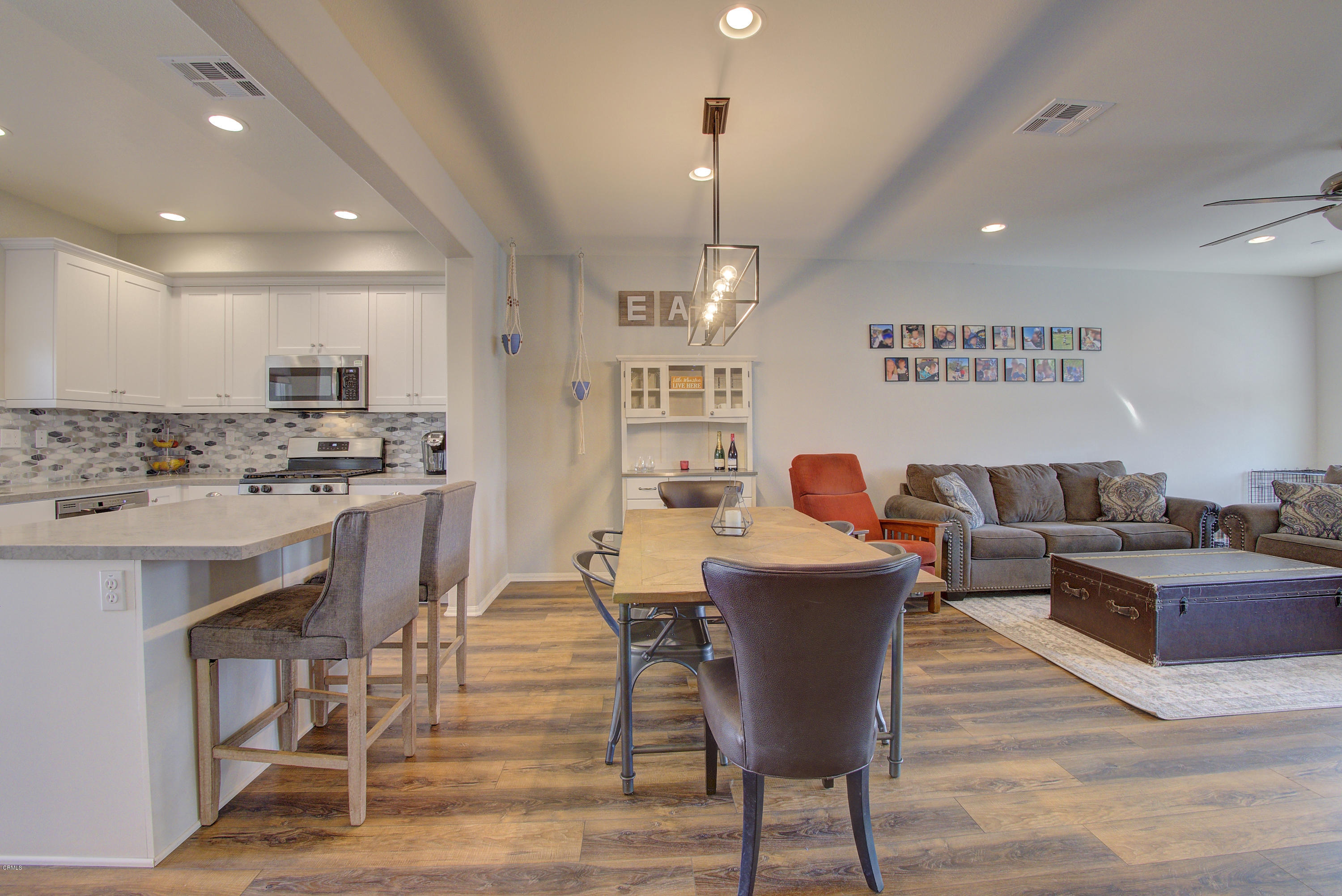 178 Prairie Street Camarillo, CA 93010 - Photo 17 of 74 a living room with kitchen island furniture and a wooden floor