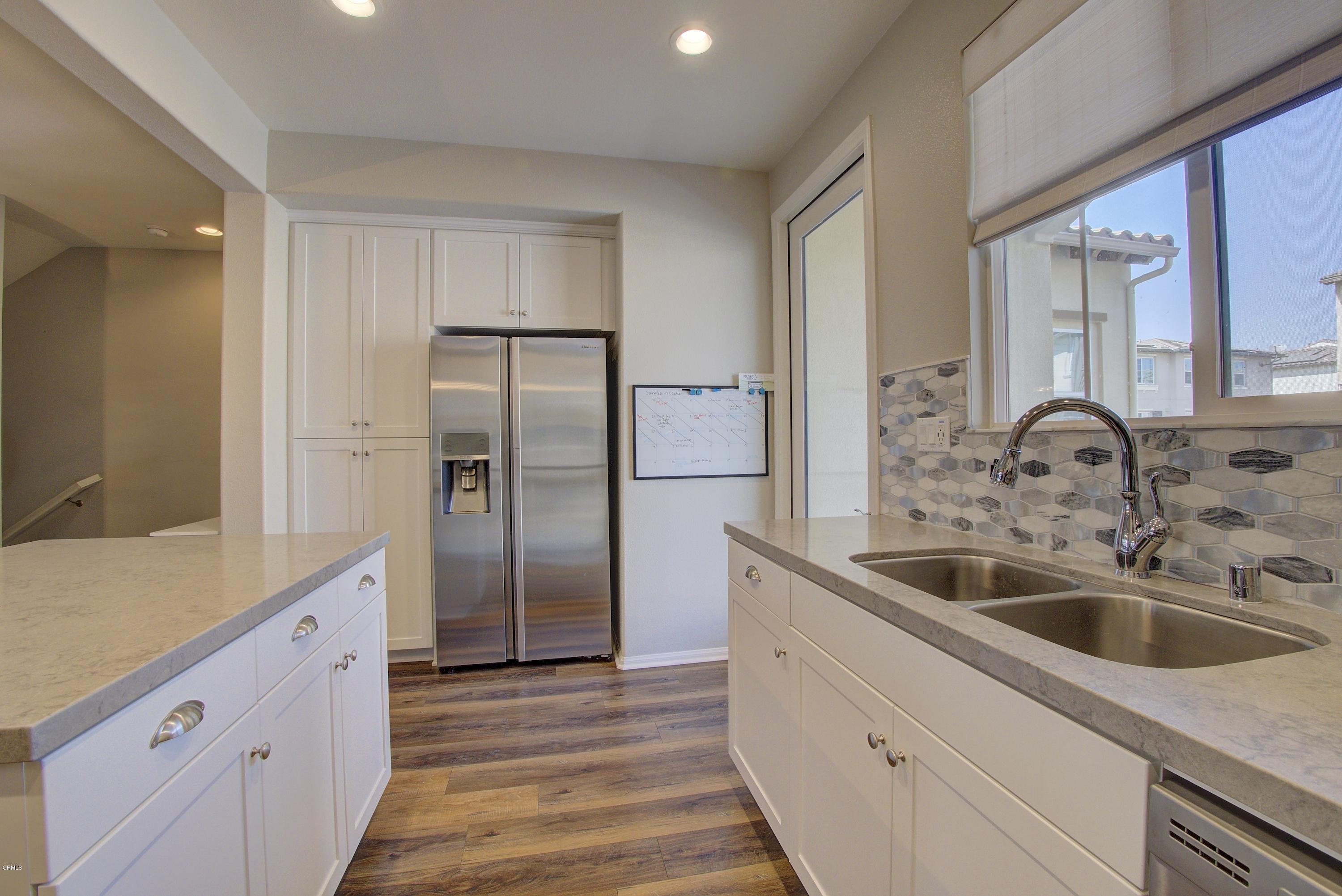 178 Prairie Street Camarillo, CA 93010 - Photo 20 of 74 a kitchen with a sink and refrigerator
