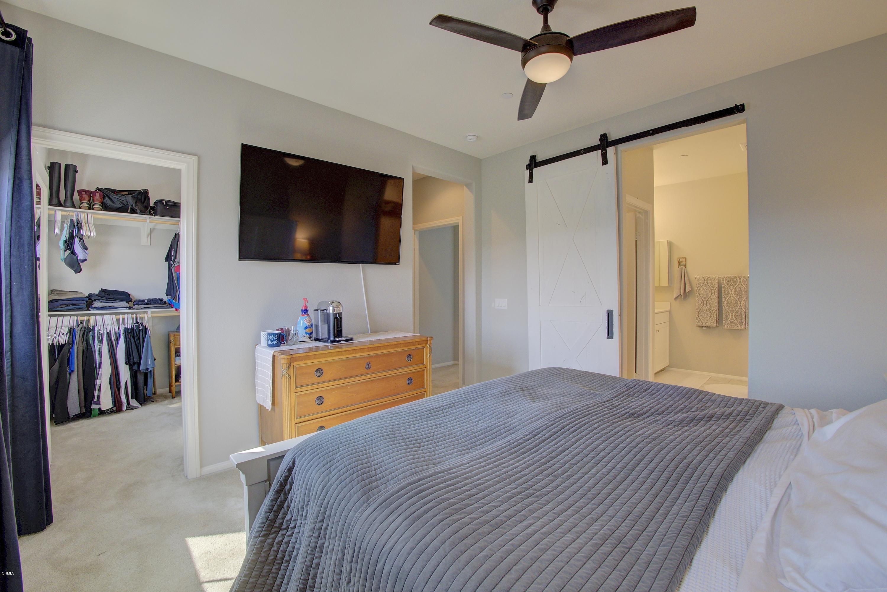 178 Prairie Street Camarillo, CA 93010 - Photo 25 of 74 a bedroom with a bed and a flat screen tv