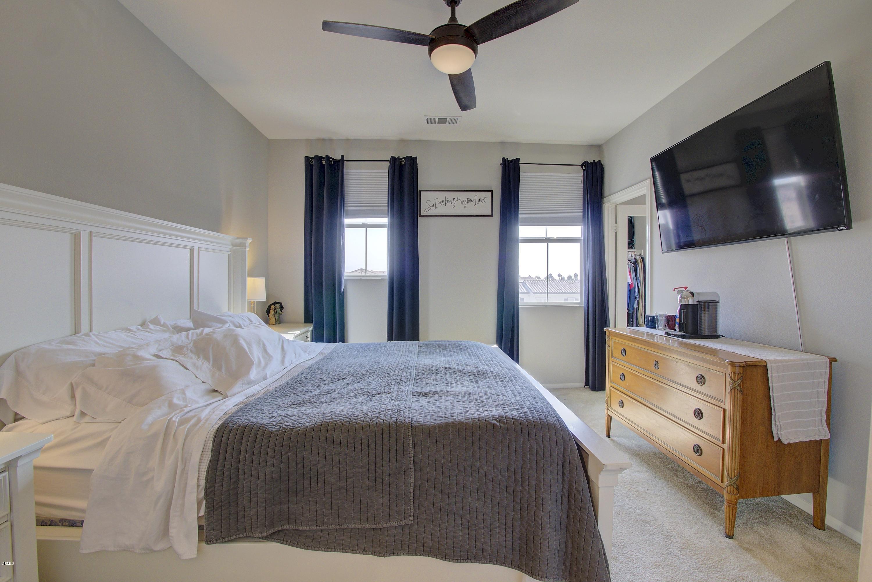 178 Prairie Street Camarillo, CA 93010 - Photo 30 of 74 a bedroom with a bed and a flat screen tv