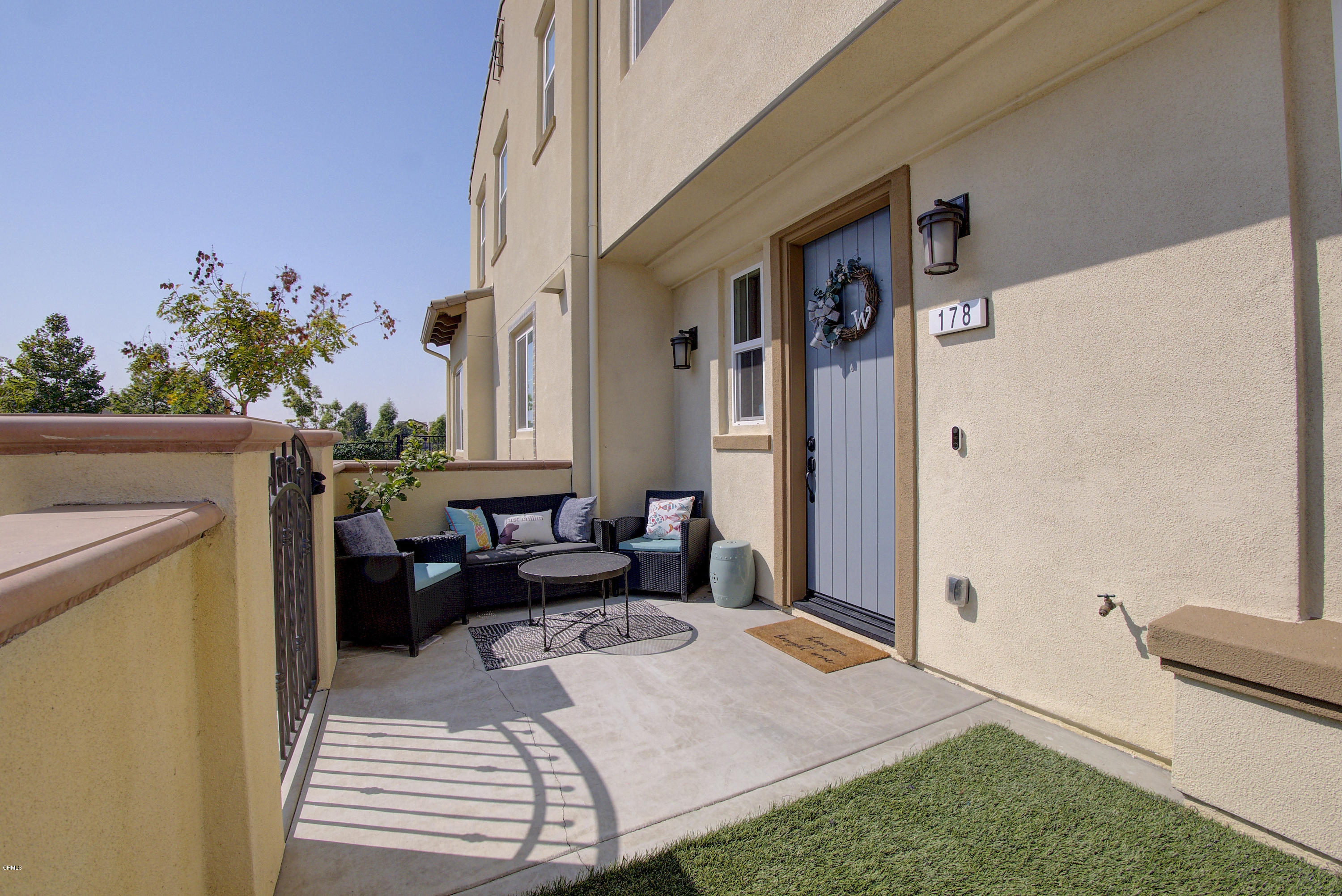 178 Prairie Street Camarillo, CA 93010 - Photo 4 of 74 a balcony view with a couch and potted plant