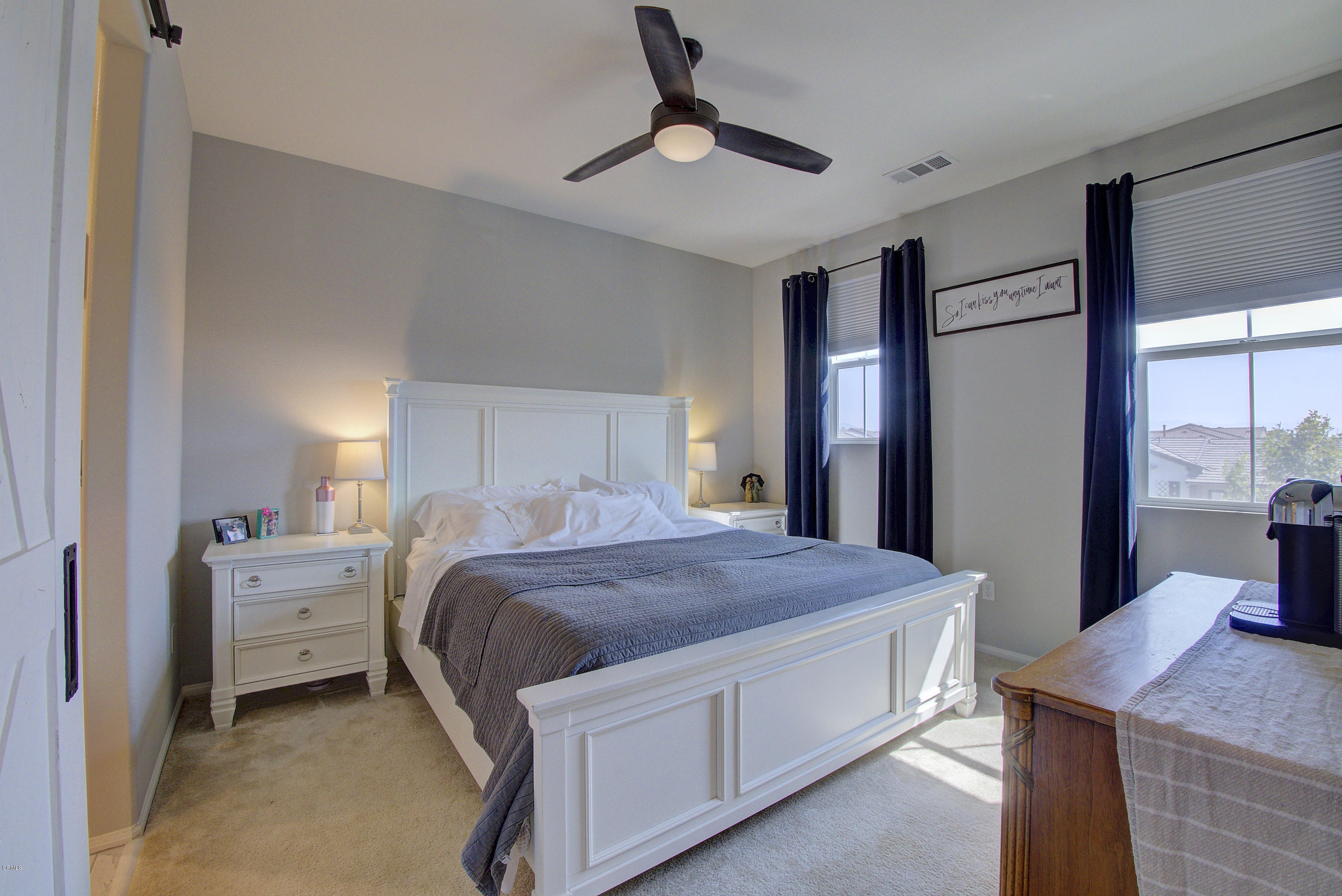 178 Prairie Street Camarillo, CA 93010 - Photo 31 of 74 a bedroom with a bed and a table in it