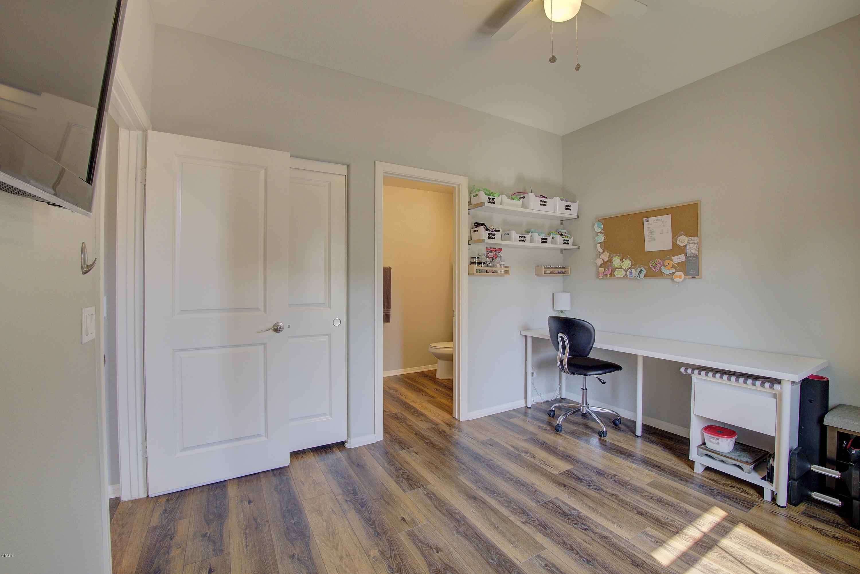 178 Prairie Street Camarillo, CA 93010 - Photo 37 of 74 a view of a workspace with furniture and a bedroom