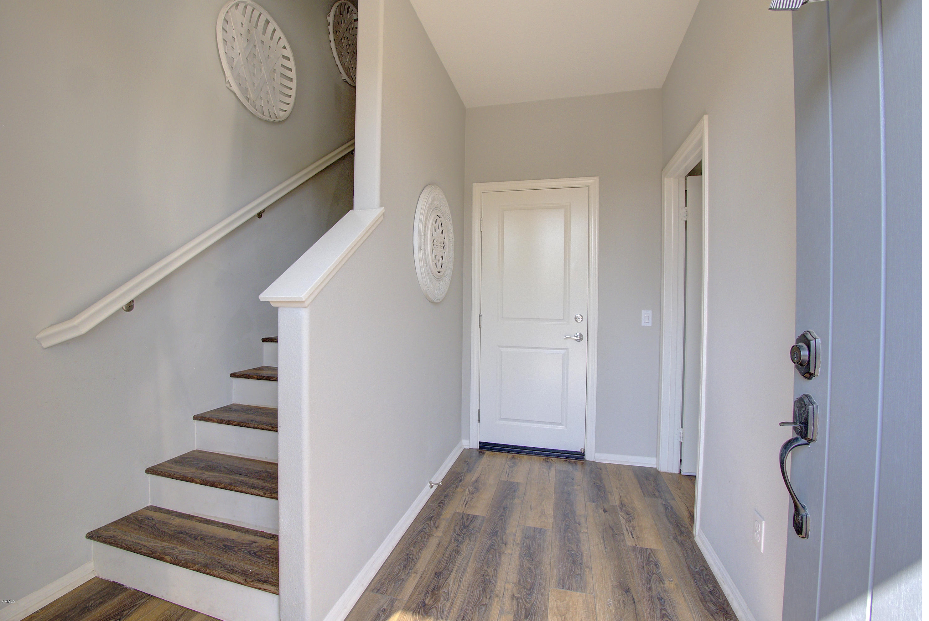 178 Prairie Street Camarillo, CA 93010 - Photo 5 of 74 a view of a hallway with wooden floor