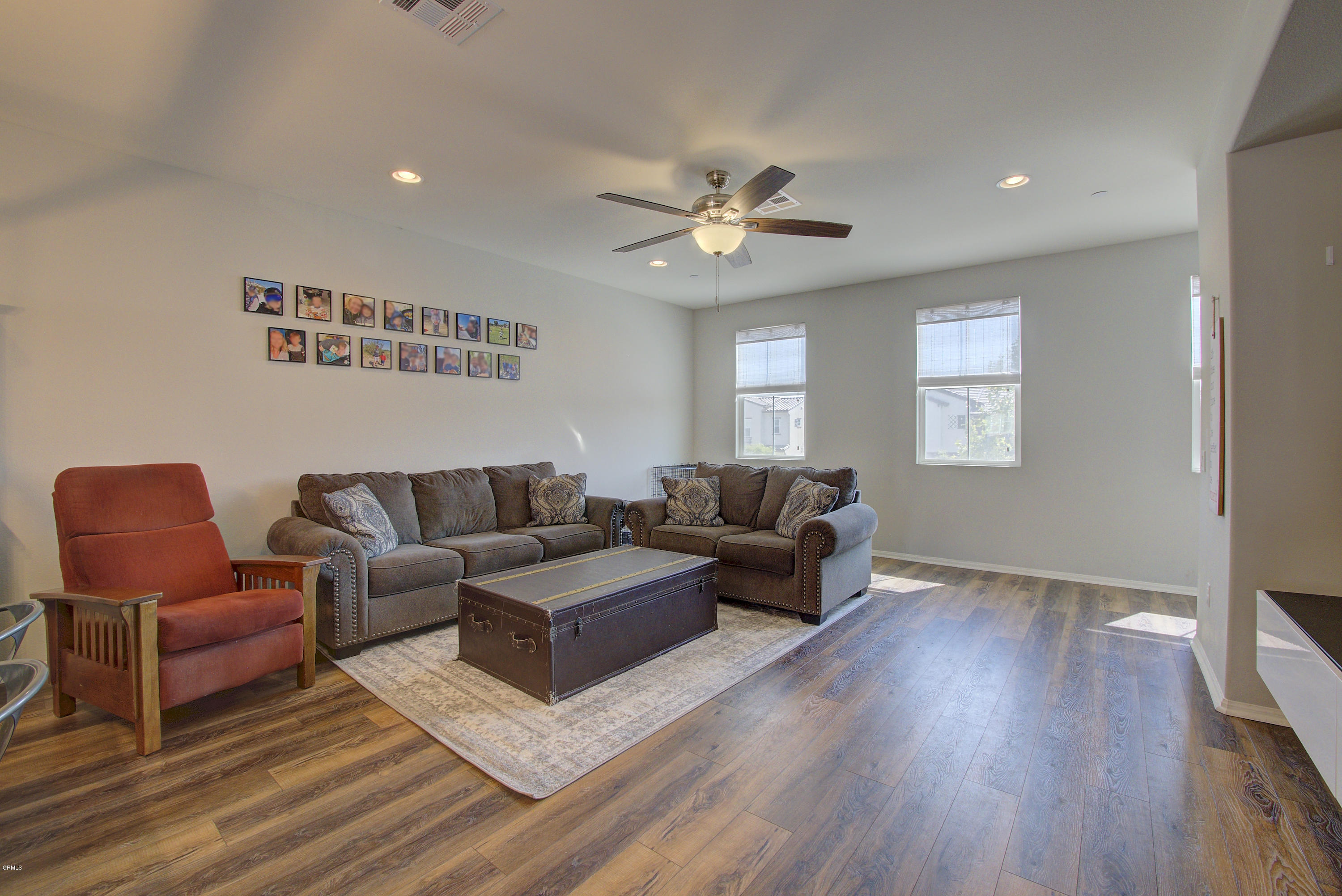 178 Prairie Street Camarillo, CA 93010 - Photo 44 of 74 a living room with furniture a ceiling fan a lamp and a window