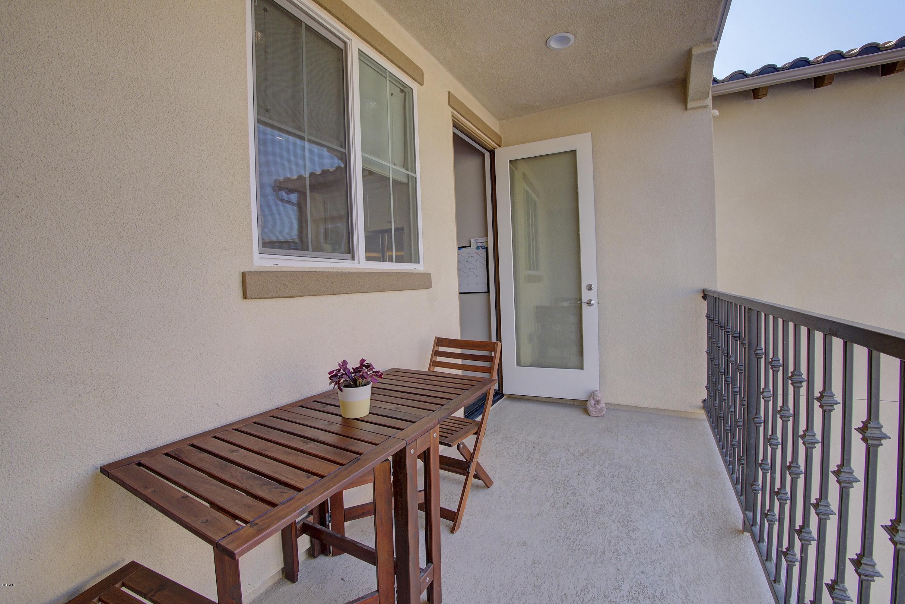 178 Prairie Street Camarillo, CA 93010 - Photo 45 of 74 a blue bench sitting in front of a house
