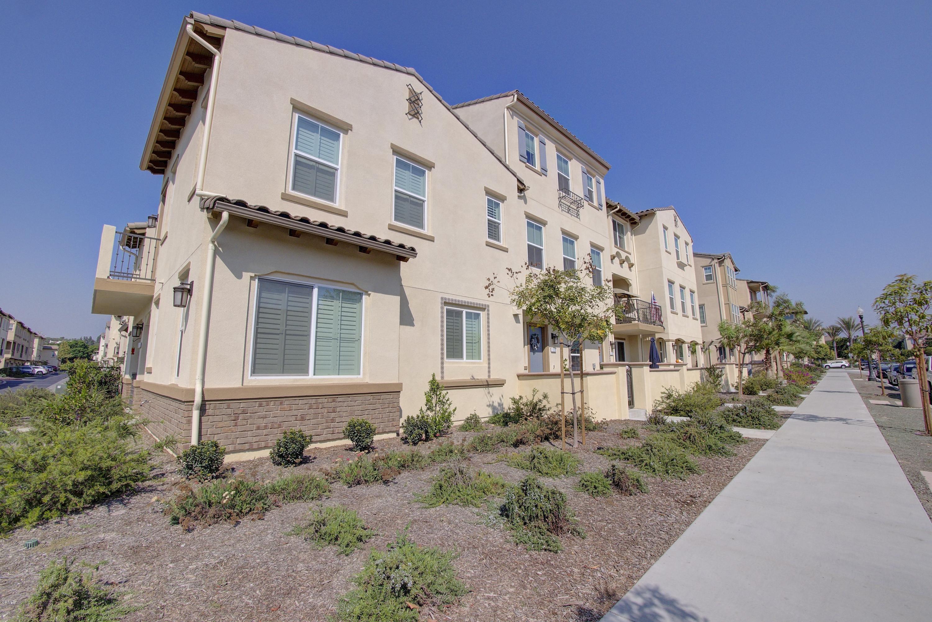 178 Prairie Street Camarillo, CA 93010 - Photo 46 of 74 a view of a white building among the street with plants