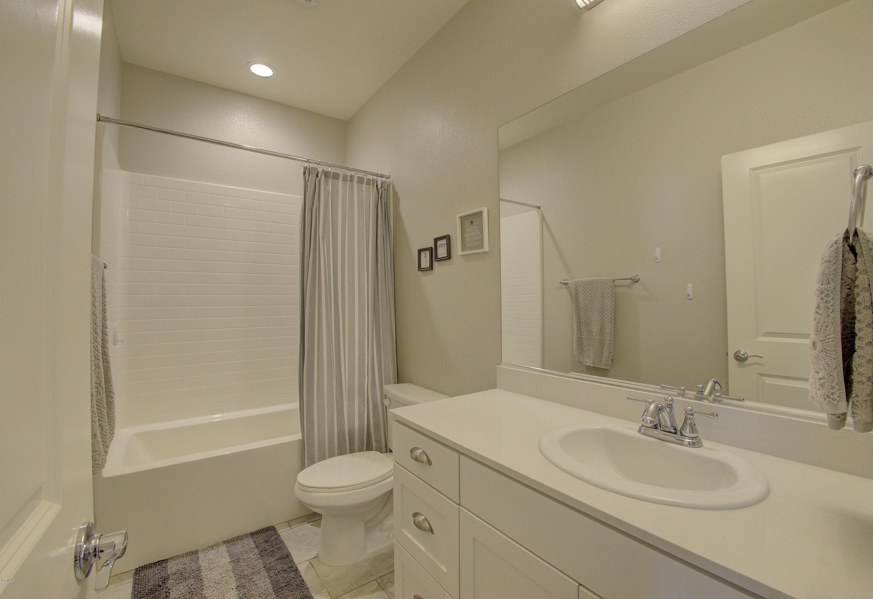 178 Prairie Street Camarillo, CA 93010 - Photo 47 of 74 a bathroom with a granite countertop sink toilet and shower