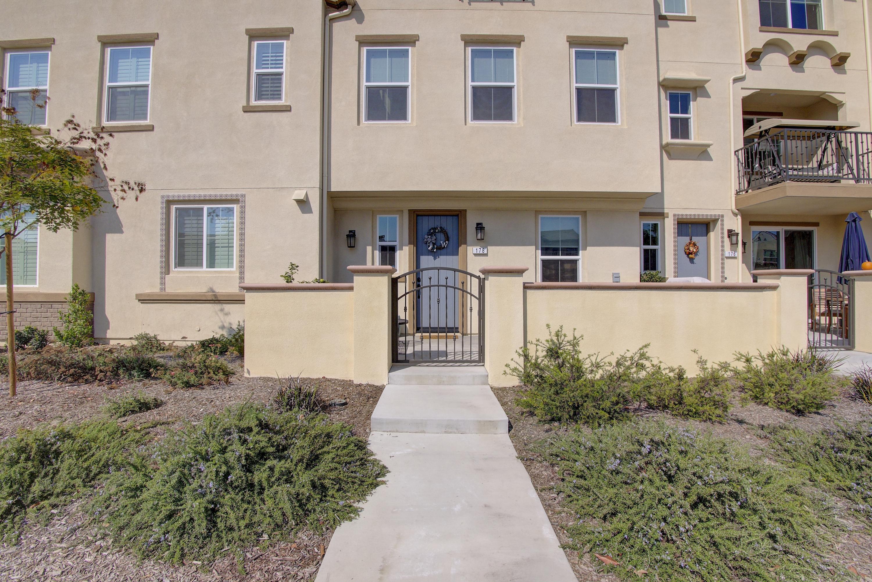 178 Prairie Street Camarillo, CA 93010 - Photo 55 of 74 a front view of a house with a yard and trees