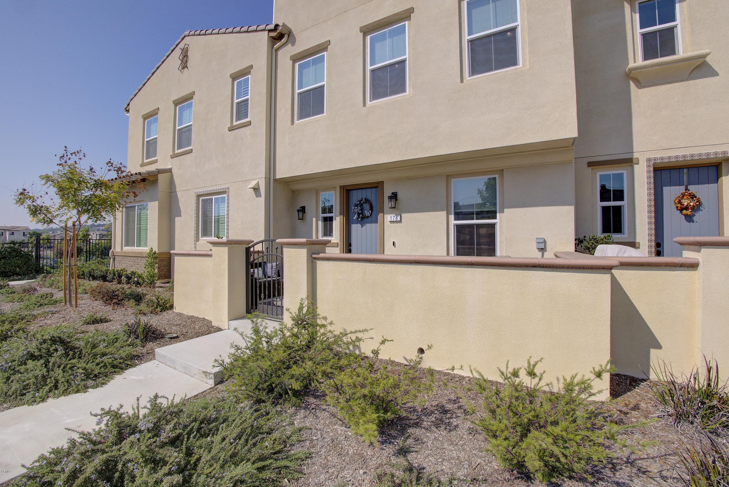 178 Prairie Street Camarillo, CA 93010 - Photo 57 of 74 a front view of a building with large trees and plants